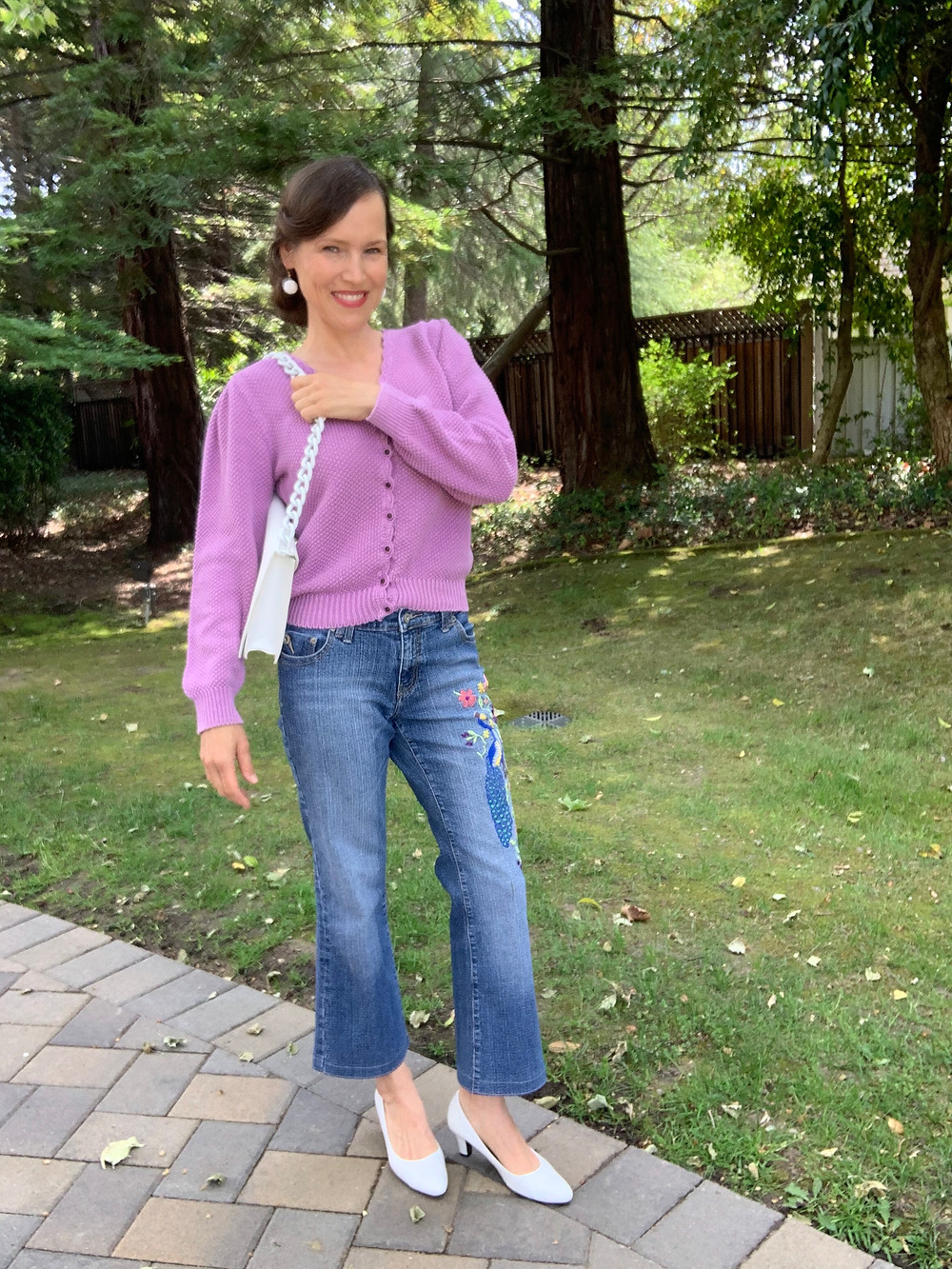 finished crop flare jeans with white heels and lavendar sweater