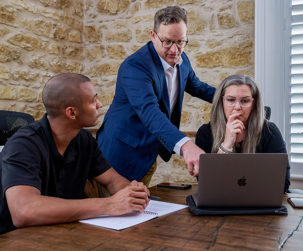 Eye-level view of a nonprofit leader reviewing donor profiles on a laptop