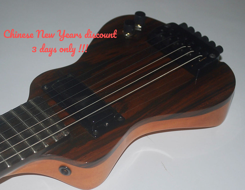 Lapaxe Guitars EX Jazz Custom, this very pretty instrument is made from a single piece of Mahogany, a solid 1 piece Indonesian Rosewood Top, and a Palu Black Ebony (Sulawesi) super smooth fretboard, complimented with our Bell brass Black plated Hardware, this Axe now for US$832,50= usual price US$925,= grab it while you can. Off course our package includes Gig-Bag Strap and EMS Internation shipping ! Standard Tuning !!! This Axe weighs in at around 2KGS and is Cabin baggage approved which means you can bring and play it anywhere, so you play more guitar so you play better guitar !