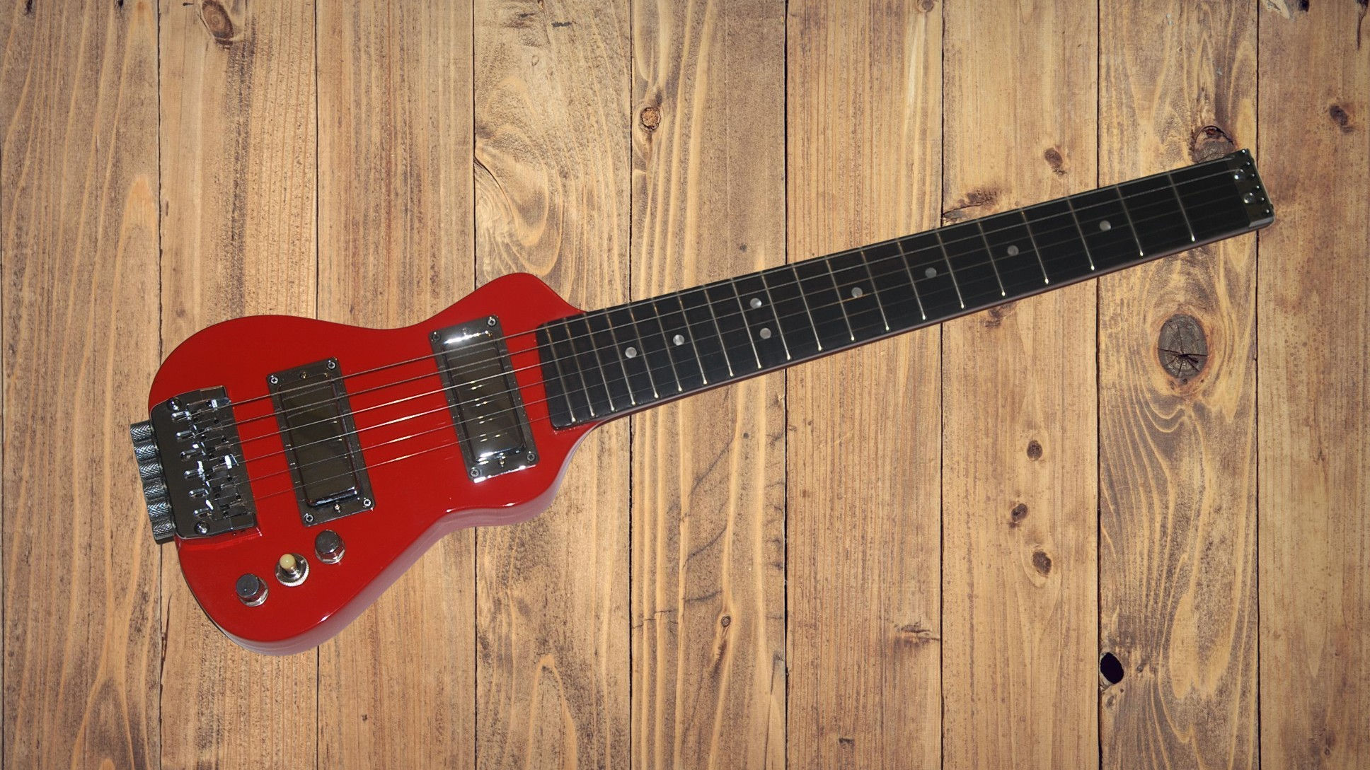 Lapaxe™ EXMH Ferrari Red travel guitar with solid mahogany body, dark rosewood fretboard, and chrome hardware