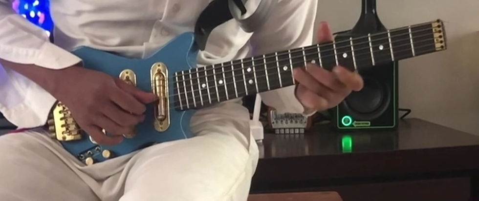 Thumbnail: Lapaxe™ Freebird Lipstick Ferrari Red travel guitar with maple neck and fretboard, three black lipstick pickups, mini toggle