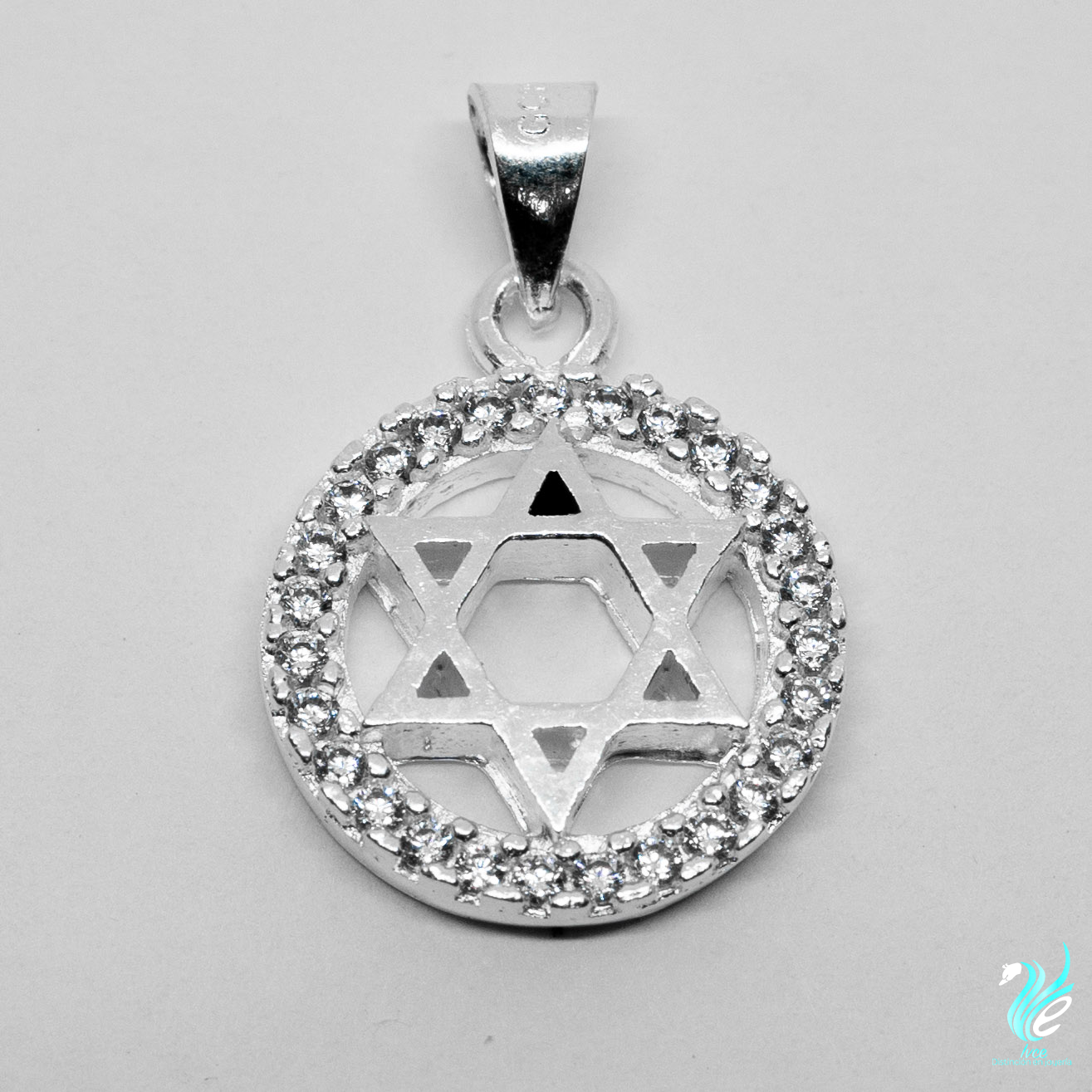 Dije estrella de plata con zirconias