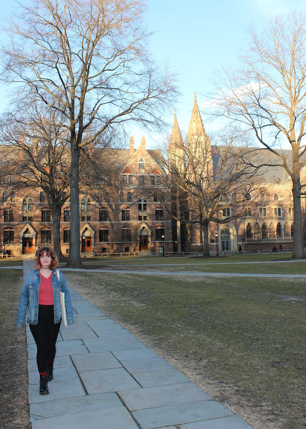 Female member of Yale College walking on Old Campus (2020)