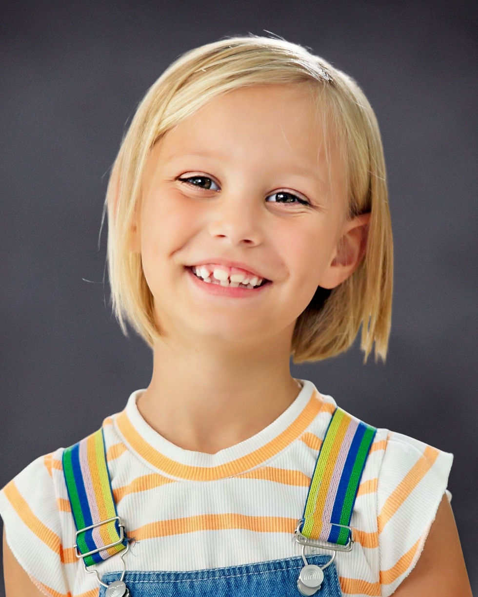 Finished school portrait of a young blonde girl by Instant School Photos