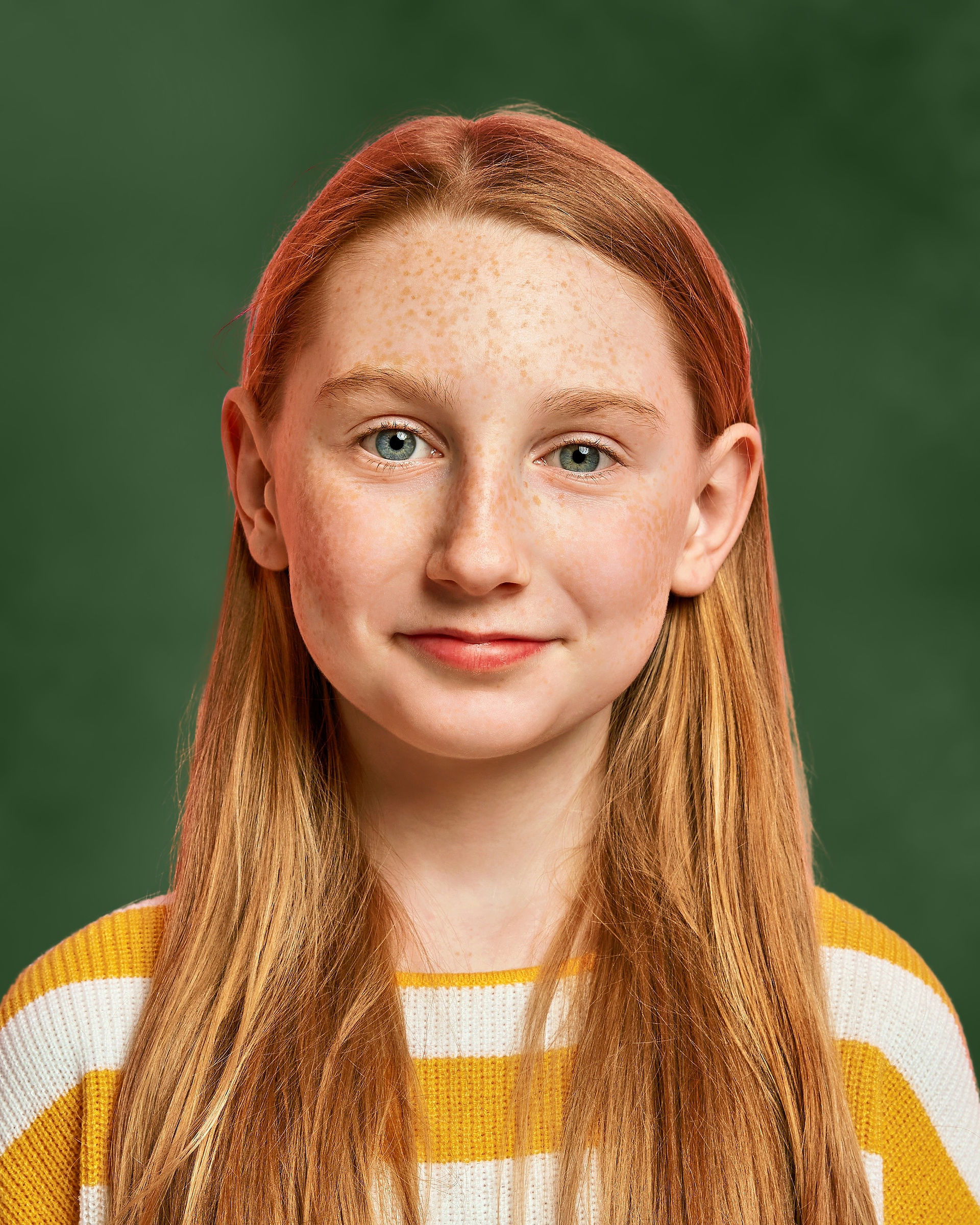 Finished School Photo on an evergreen background