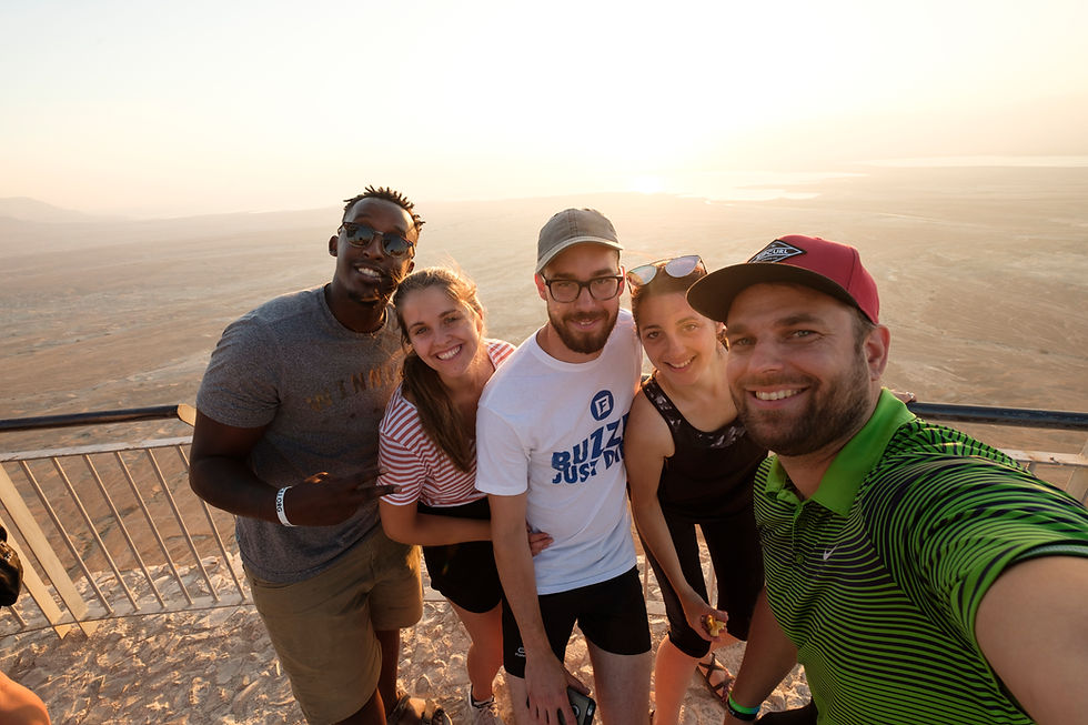 5 young adults in a group photo on Masada Israel