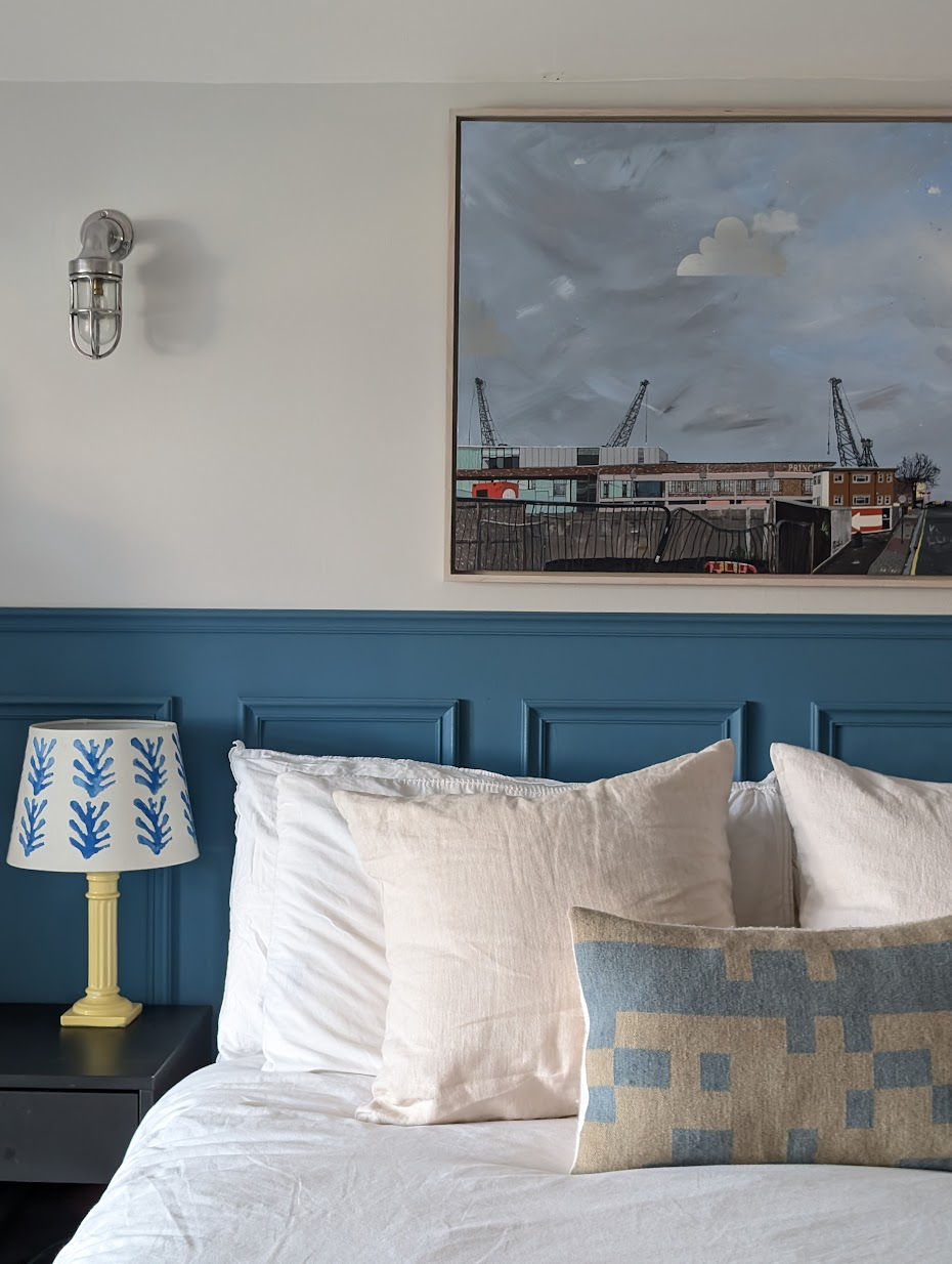 The M shed Bristol urban landscape painting above a bed