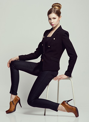 chic female model wearing a denim suit