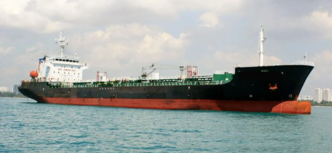 Indian Coast Guard inspecting a tanker seized in the Arabian Sea as part of operations against the shadow fleet involved in illicit oil transport.