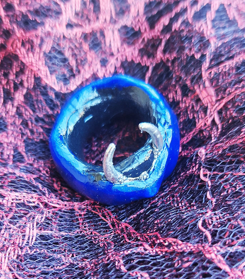 Thumbnail: Occult moon ring on dark textured background