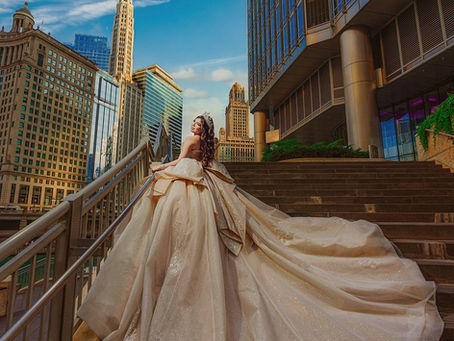 Quinceañera trying on a quinceañera dress at a boutique before her celebration