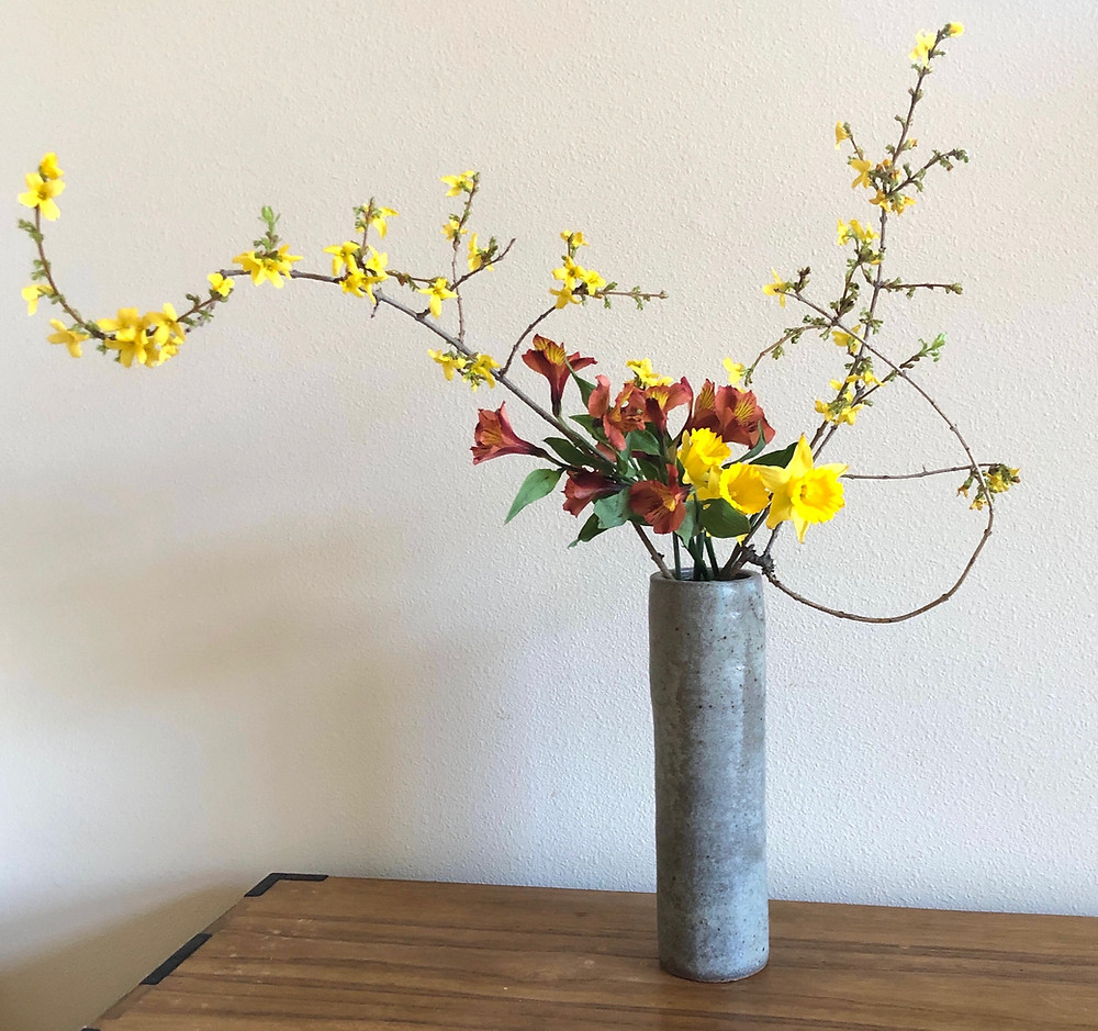 Nageire style ikebana, forsythia, alstroemeria, daffodil.