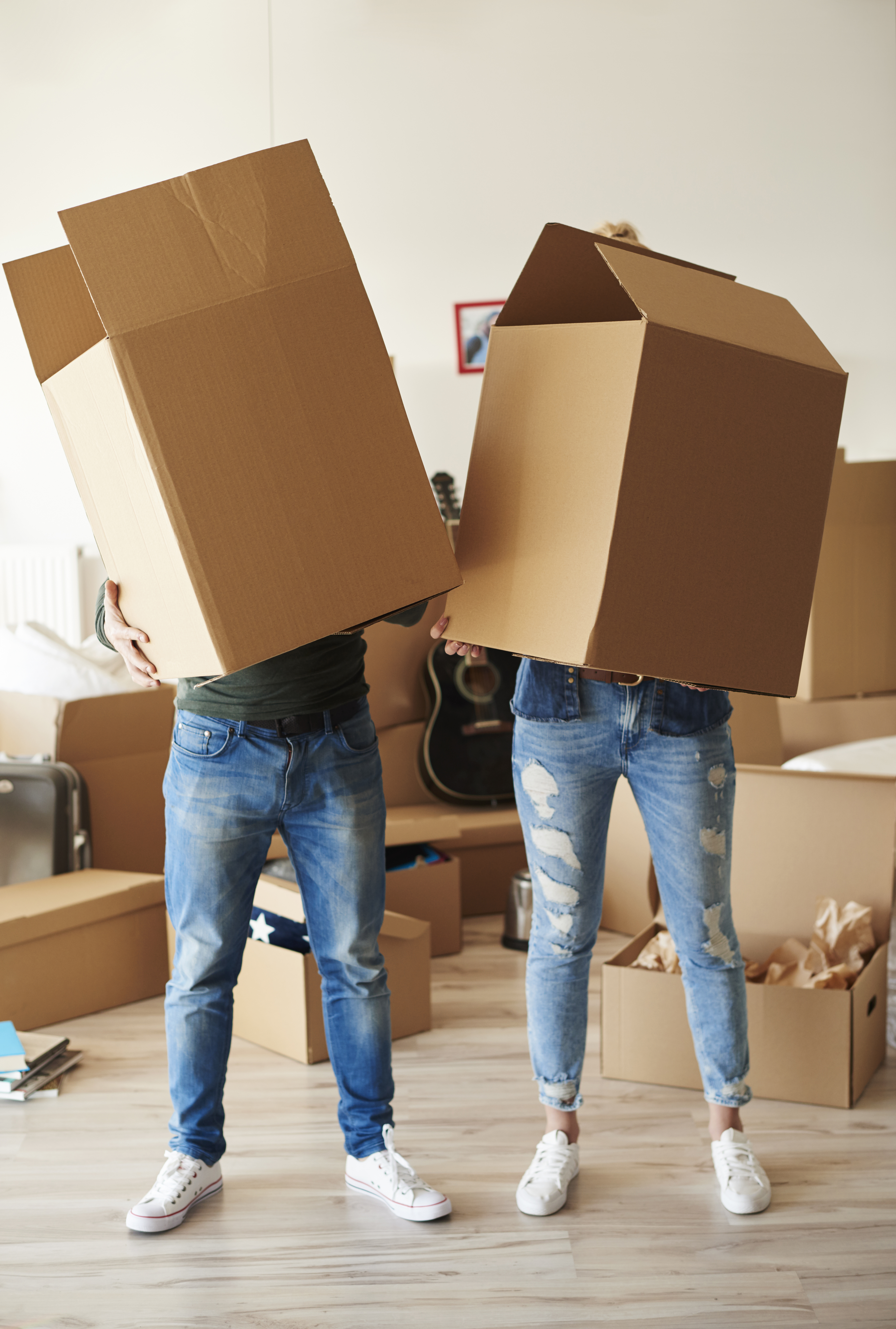 couple-faces-cardboard-boxes.jpg