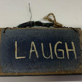 Blue Laugh Sign