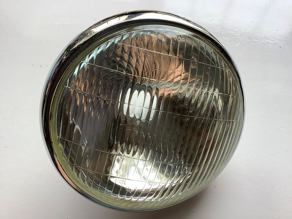 Used Chrome Headlight Rim & Lense.