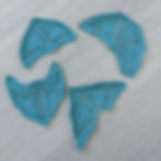 4 blue cotton mini shawl whose geometric shapes can be distinguished because they are blocked