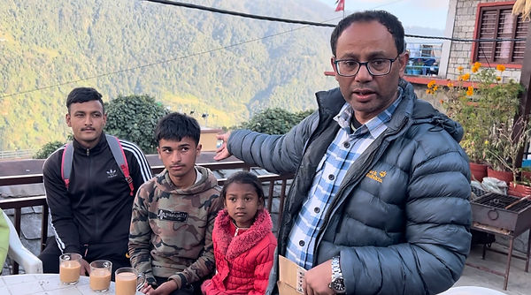 Dil Sapkota of Adventure Glacier Trekking Nepal helping distribute funds for Project Solshine