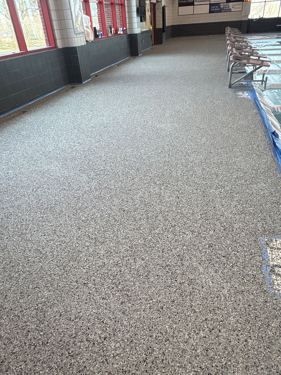 Drury University pool deck after non-slip flake coating — finished surface, Combs Custom Concrete