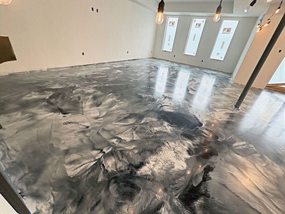 Metallic epoxy basement floor after coating — third angle completed installation, Combs Custom Concrete