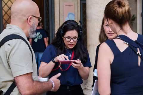 Event Planning – Staff assisting guests at an international event.