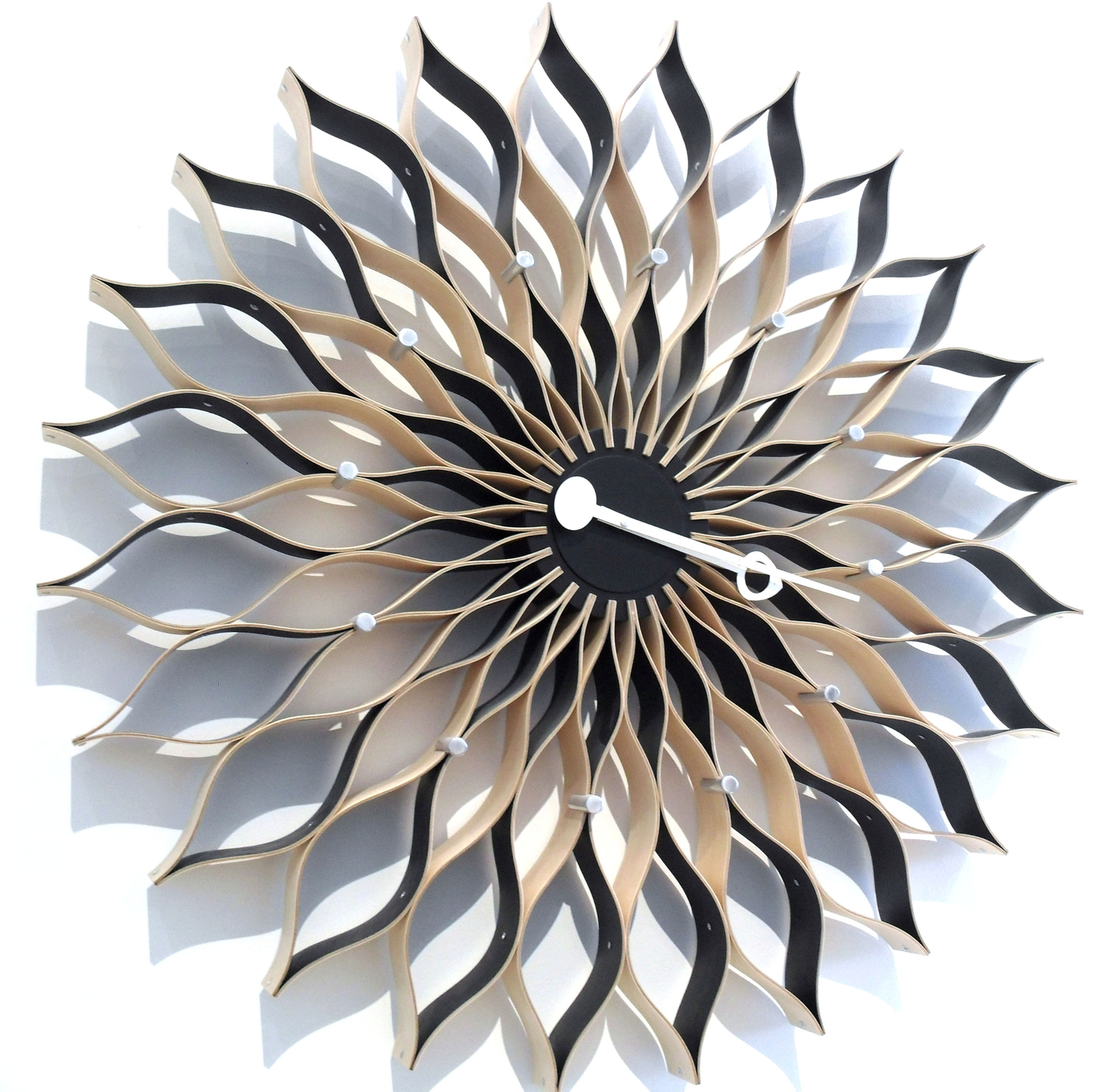 right font view of a Sunflower Wall Clock, natural sun shine and geometrically aesthetic shadow