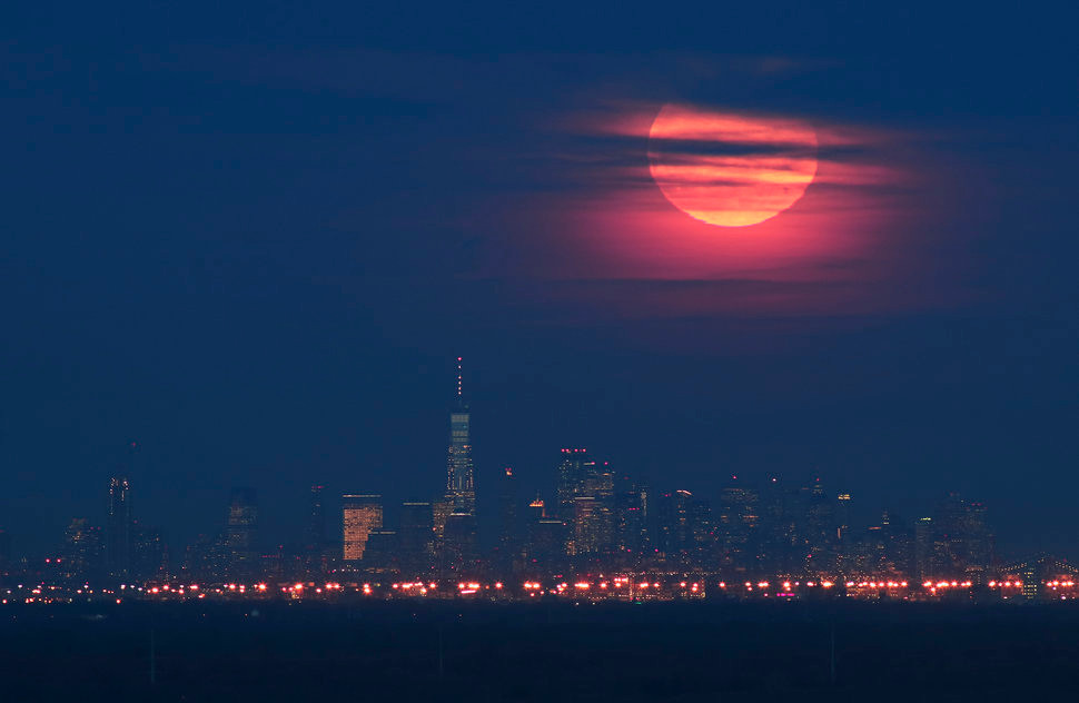 Super Snow Moon over Manhattan skyline