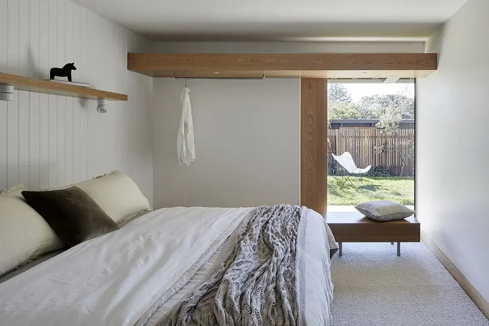 White wall Bedroom with natural light inside Sand Dune Sanctuary by Hindley & Co.