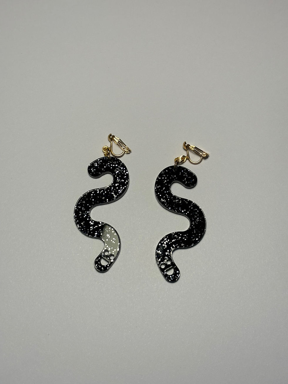Thumbnail: Black Glitter Worm Earrings - Clip Ons