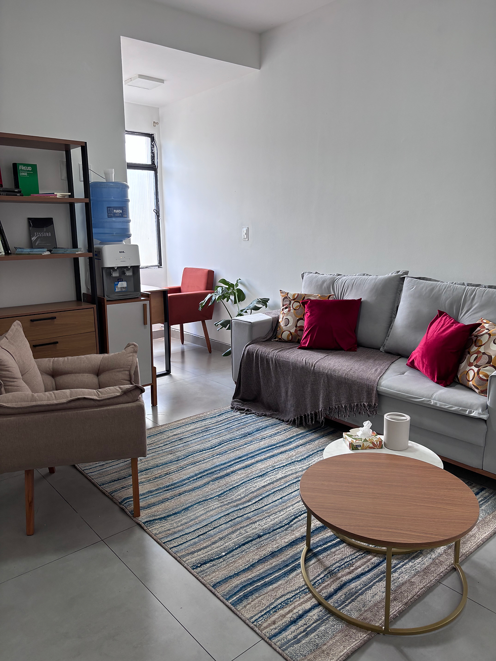 Close-up view of a therapist's office with a comfortable couch and soft lighting