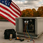 HVAC system being teted and american flag flying in background