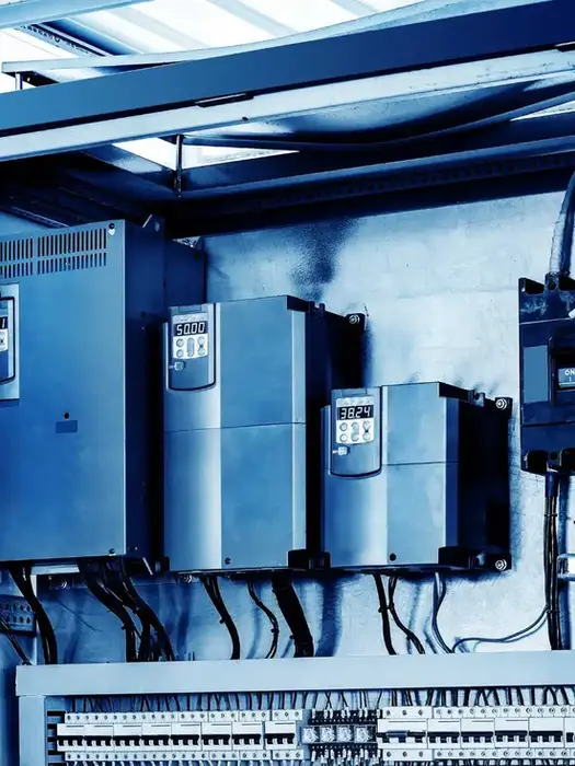 Close-up of a commercial HVAC unit featuring a variable frequency drive for fan speed control and energy efficiency.