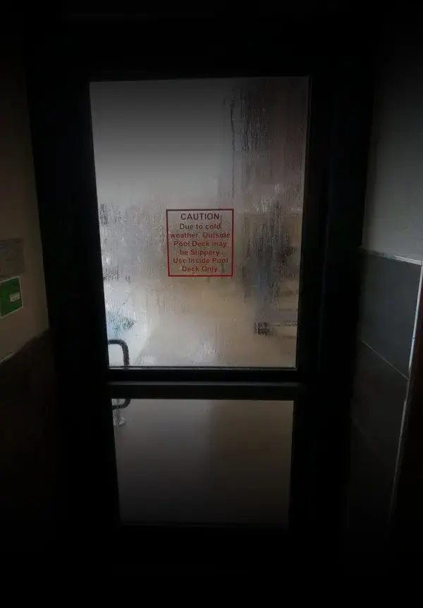 humidity on door of a commercial buildings pool room