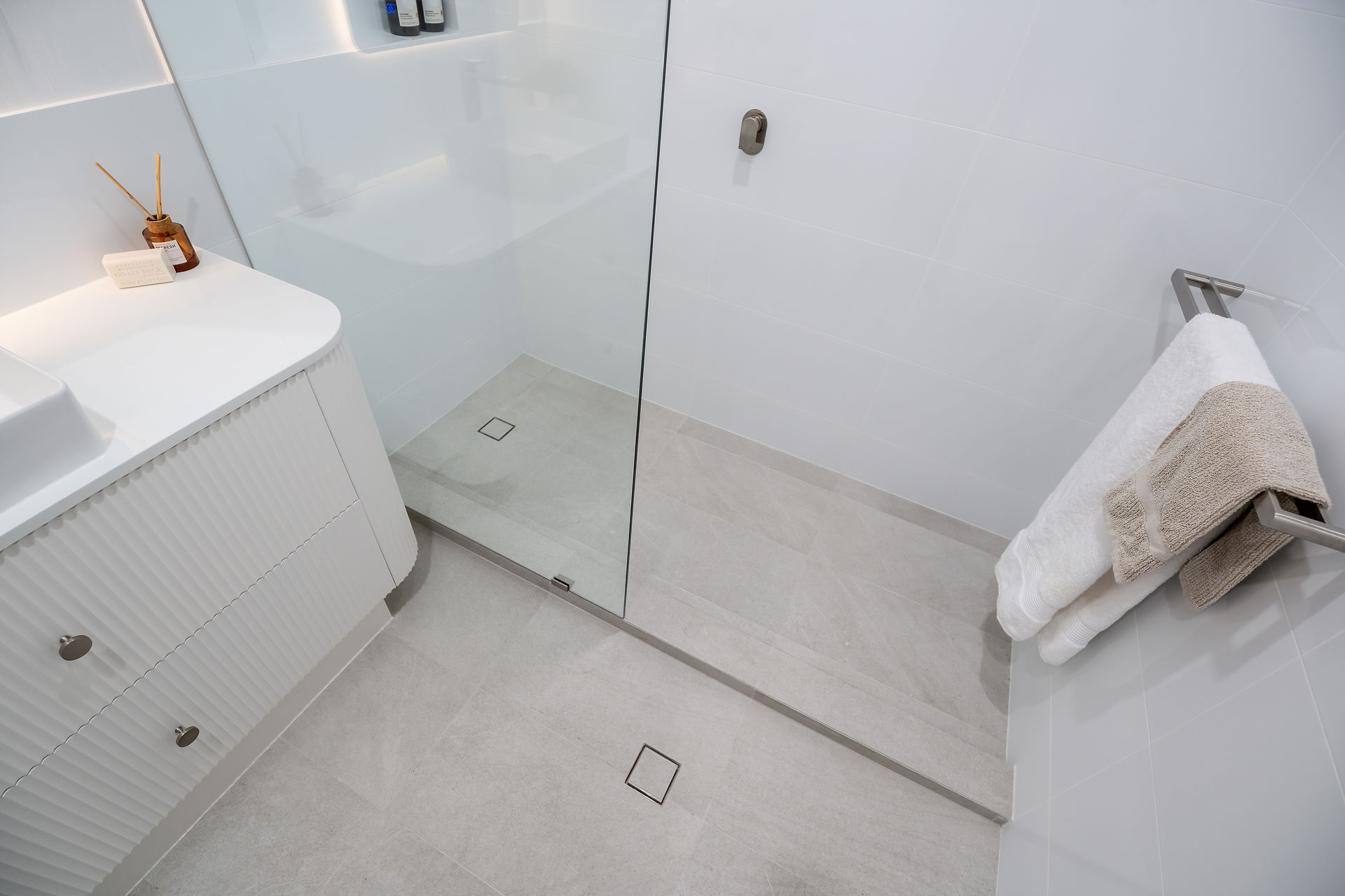 Modern bathroom with a glass door shower