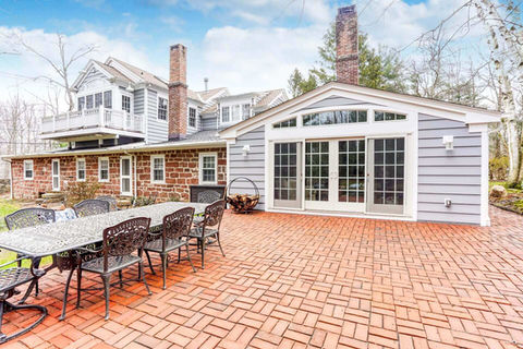 Luxury home addition by Peluso Construction featuring custom exterior finishes, expanded living space, architectural detailing, and high-end residential construction in Rockland County NY.