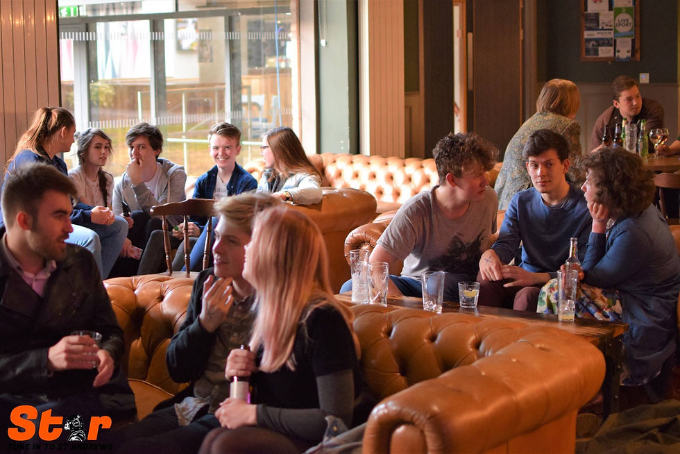 Sandy's Bar had leather couches. Photo credit: St Andrews Radio