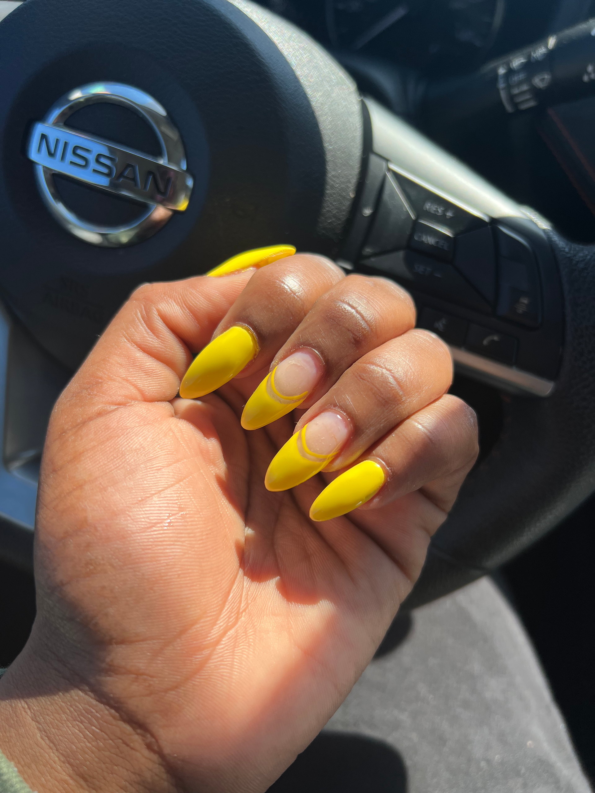 Image of yellow nails.