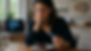 A thoughtful woman holds a weight-loss injection pen while sitting in front of an untouched dessert, with brain imagery in the background suggesting the link between GLP-1 drugs, appetite, and the brain.