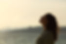 woman silhouette breathing fresh air on the beach.jpeg