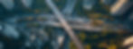 vecteezy_aerial-view-of-a-busy-highway-interchange-surrounded-by_50681531.jpg