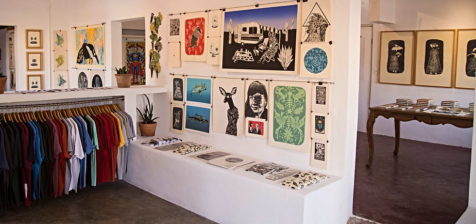 Colorful and intricate Mexican folk art sculptures on display at the Galería La Sonrisa de la Muerte in Todos Santos, Baja California Sur.