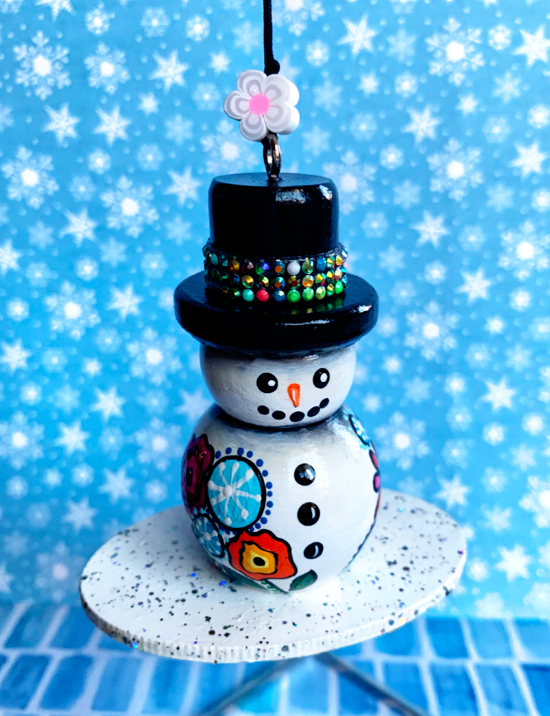 Thumbnail: White Flowered Snowman Ornament