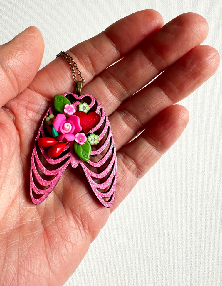 Thumbnail: Pink Rib Cage Pendant Necklace