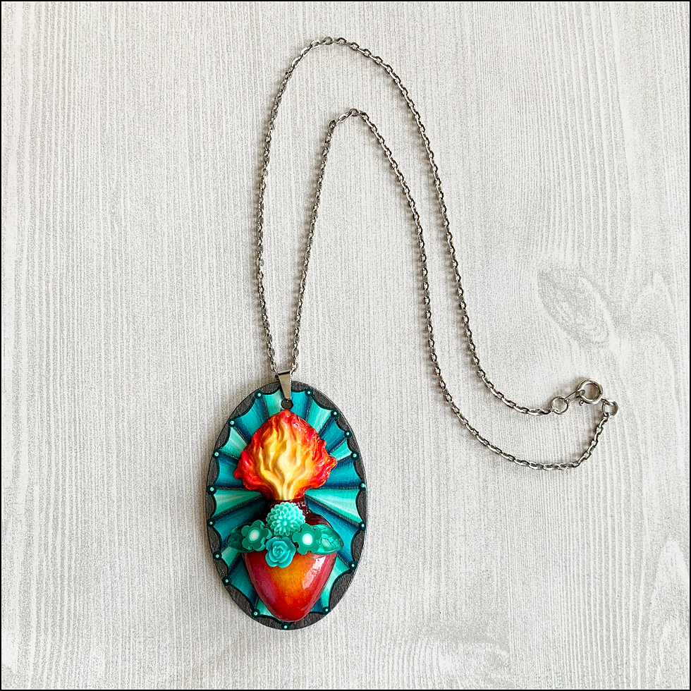Thumbnail: Teal Oval Sacred Heart Pendant Necklace