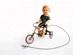 Boy on Tricycle
