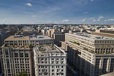 Aerial view of Washington DC with a blue sky and clouds.jpg