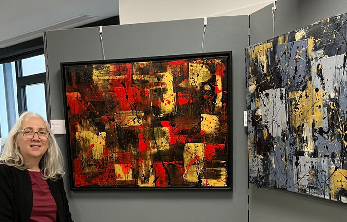 Two abstract paintings one red the other blue with both with gold and black and the artist AMSonArt