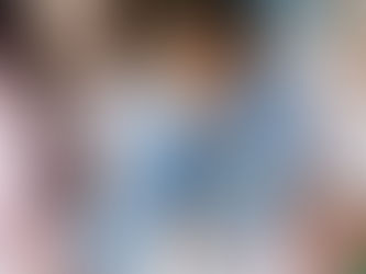 A group of children highly focused on a single activity - drawing.