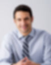 Man Sitting with a Tie