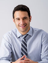 Man Sitting with a Tie