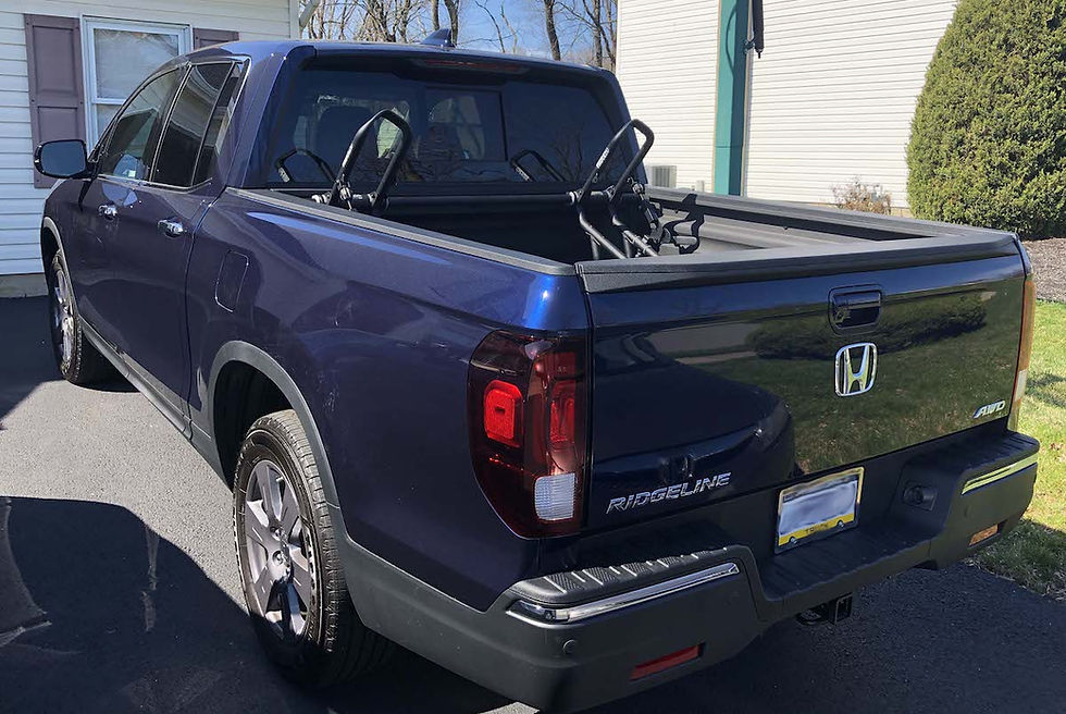 Thumbnail: A Honda Ridgeline with two RIDE88 QR3 Bike racks